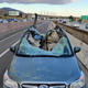 Image for article titled A Catastrophic Failure Caused A Tractor-Trailer Wheel To Slam Into This Subaru